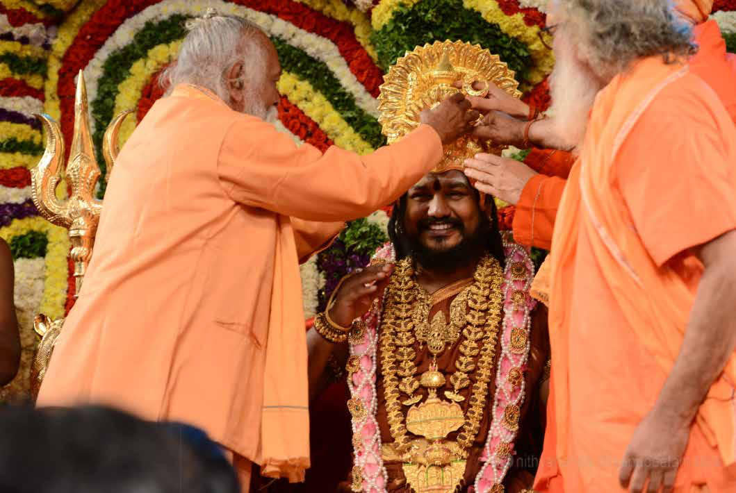 2016 Śri Ravindra Giriji, the current head of Akhāḍā Parishad and other Akhāḍā leaders honor The SPH with a ceremonial crowning in Adi KAILĀSA Sarvajnapeetha, India.