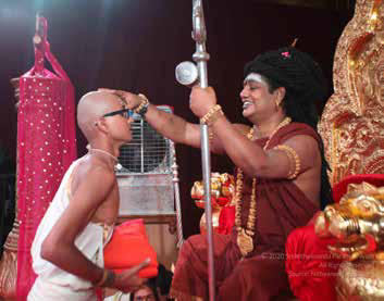 Blessed disciples receive the initiation into the lifestyle of sanyas from the incarnation of Paramaśiva, The SPH1