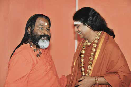The SPH with a Mahamandaleśvar of the Mahānirvaṇi Akhāḍā, discussing the spiritual services of the Akhāḍā. The SPH inaugurating a new KAILĀSA in kanchipuram